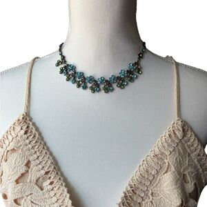 Elegant Floral Necklace with Blue Accents